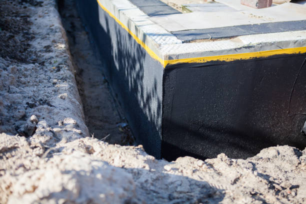 Professional Waterproofing technician working in Donnelsville, OH